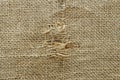 Burlap texture with a hole Royalty Free Stock Photo