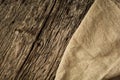 Burlap texture on rustic wooden table background. Free space for text. Flat lay Royalty Free Stock Photo