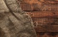 Burlap texture on wooden background Royalty Free Stock Photo