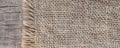 Burlap textureon a wooden background, rustic, christmas . Panorama.Pattern fabric textile. Texture background