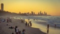 Burleigh Heads, Gold Coast, Australia - People walking along the beach at sunset