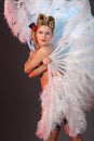 Burlesque artist with ostrich feather fan