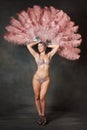 Burlesque dancer with feather fans Royalty Free Stock Photo