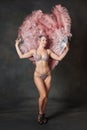 Burlesque dancer with feather fans