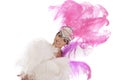 Burlesque dancer in white dress with pink plumage