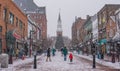Snowing on Christmas Eve while shopping in a Vermont City Royalty Free Stock Photo