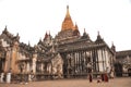 Burma monk and burmese people and foreign travelers travel visit respect praying in Ananda paya temple pagoda chedi at Bagan or