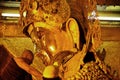 Burma senior monk and Burmese elaborate ancient tradition ritual of face wash and brush teeth to Maha Myat Muni Buddha image