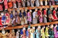 Burma traditional puppets hanging for sale in front of a pagoda in Mandalay, Myanmar.