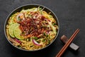 Burmese Atho on black slate table top. Atho is myanmar indian cuisine dish popular in Chennai. Asian food and meal