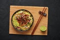 Burmese Atho on black slate table top. Atho is myanmar indian cuisine dish popular in Chennai. Asian food and meal