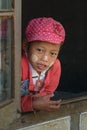 Burmese child with thanaka-painted face