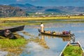 A Shan family leaving the weekend market, Inle Lake, Myanmar