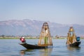 Burmese fisherman catching fish in Inle lake, Myanmar Burma by