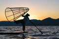 Burmese fisherman posing for tourists at Inle lake, Myanmar Royalty Free Stock Photo