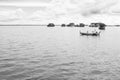 Burmese fishermen in small fishing boats near U-Bein Bridge, in Taungthaman Lake, Amarapura, Myanmar Royalty Free Stock Photo