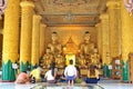 Burmese and foreign tourists have praying in the prayer hall at Shwedagon pagoda 1 of 5 sacred places