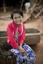Burmese girl with danaka paste on face