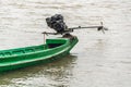 Burmese homemade motor boat resting on riverbank 2