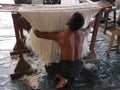 Burmese man working in homemade noodle factory, Myanmar