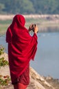 Burmese monk taking a picture