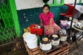 Burmese people cooking food for sale at rangoon market