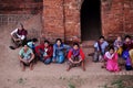 Burmese people women group sit and wait visit and looking sunrise at World Heritage Site with over 2000 pagodas and temples at