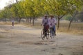 Burmese women riding the bikes