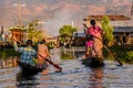 Burmese women rowing on wooden boats, Inle Lake, Myanmar