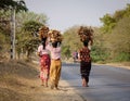 Burmese women walking on road in Inle, Myanmar