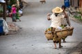 Burmese women who carry food with a typical method.