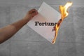 Burn fortune text on burning paper