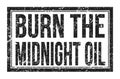 BURN THE MIDNIGHT OIL, words on black rectangle stamp sign