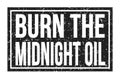 BURN THE MIDNIGHT OIL, words on black rectangle stamp sign