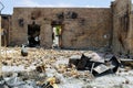 Burned abandoned burned dark walls with dust selective focus in the US burns violent of a burnt by fire building