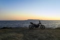 Burned abandoned motorcycle on the beach - Zakynthos / Zante island Royalty Free Stock Photo