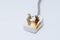 Burned ac Power Plugs and Sockets Royalty Free Stock Photo
