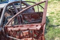 Burned car with burnt glass and windows