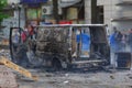 Burned car in the center of city after unrest Royalty Free Stock Photo