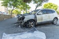 Burned car close up. Car after the fire, crime of vandalism, riots. Arson car. Accident on the road due to speeding Royalty Free Stock Photo