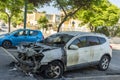 Burned car close up. Car after the fire, crime of vandalism, riots. Arson car. Accident on the road due to speeding