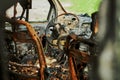 Burned car interior close up, vehicle fire damaged motor vehicle, car fire Royalty Free Stock Photo