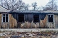 Burned by fire abandoned wooden house Royalty Free Stock Photo