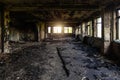 Burned interiors after fire or attack in industrial or office building Royalty Free Stock Photo