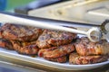 Burned Juicy Steaks barbecue Sizzle on with Salt and Black Peppers Royalty Free Stock Photo