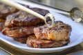 Burned Juicy Steaks barbecue Sizzle on with Salt and Black Peppers Royalty Free Stock Photo