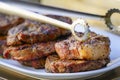 Burned Juicy Steaks barbecue Sizzle on with Salt and Black Peppers Royalty Free Stock Photo