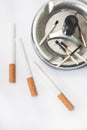 Burned matches in the ashtray and filter cigarettes Royalty Free Stock Photo