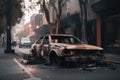 burned-out car on city street after massive firestorm