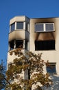 Burned out house in a town Royalty Free Stock Photo